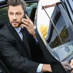 Luxury black car providing airport transportation to Boston Logan Airport