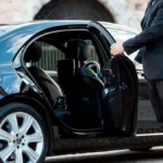 Luxury car transporting fans to Gillette Stadium for the World Cup 2026 matches